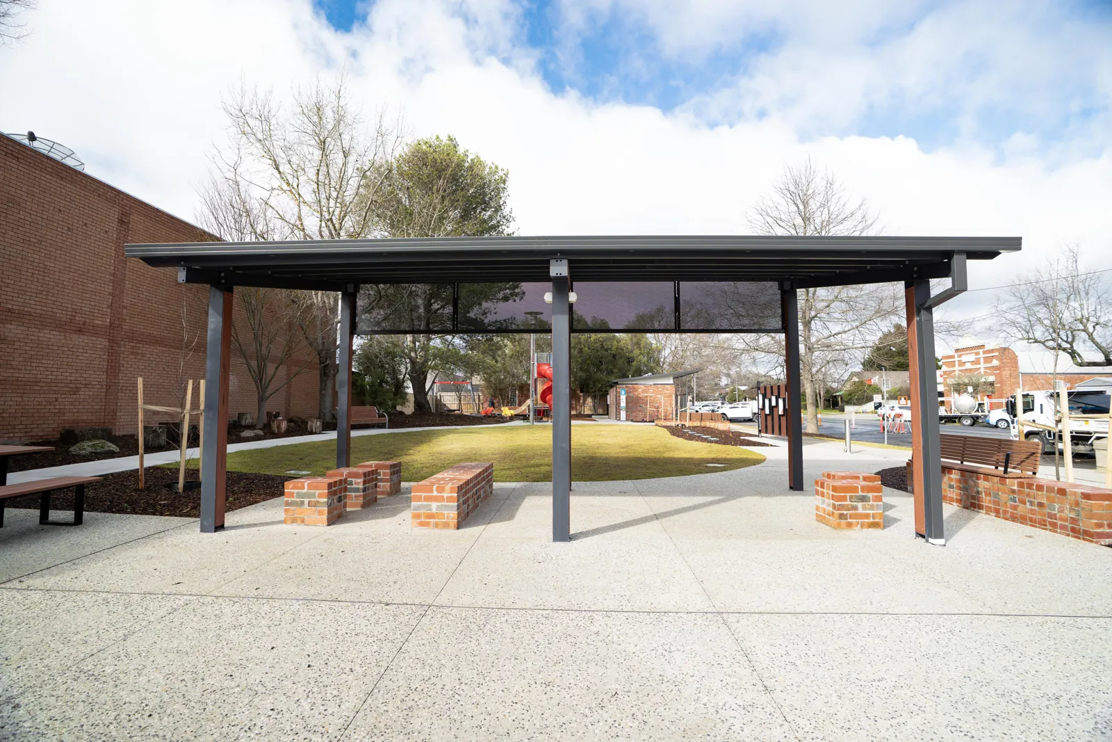 Completed shade shelter and seating in a public reserve