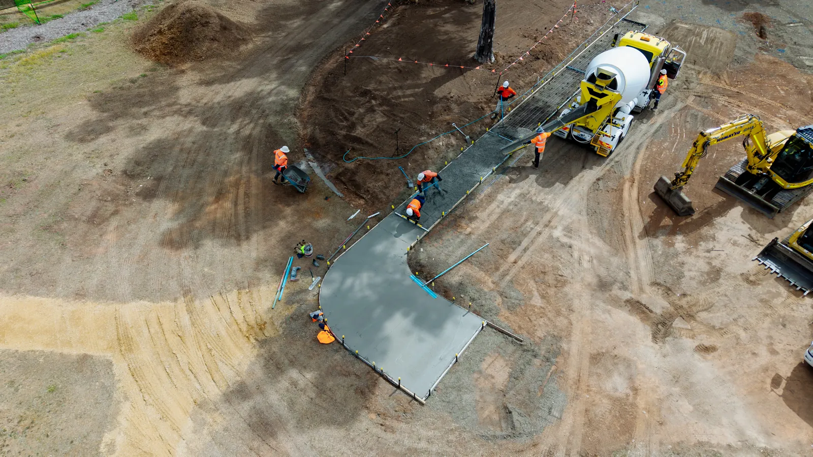 Aerial view of a concrete path pour on a civil site